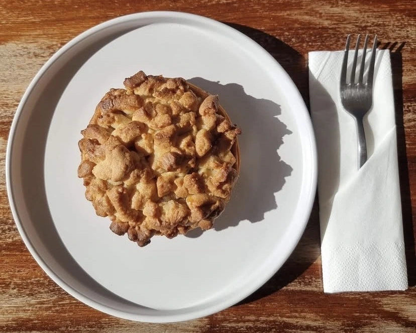 An apple pie with a fork.