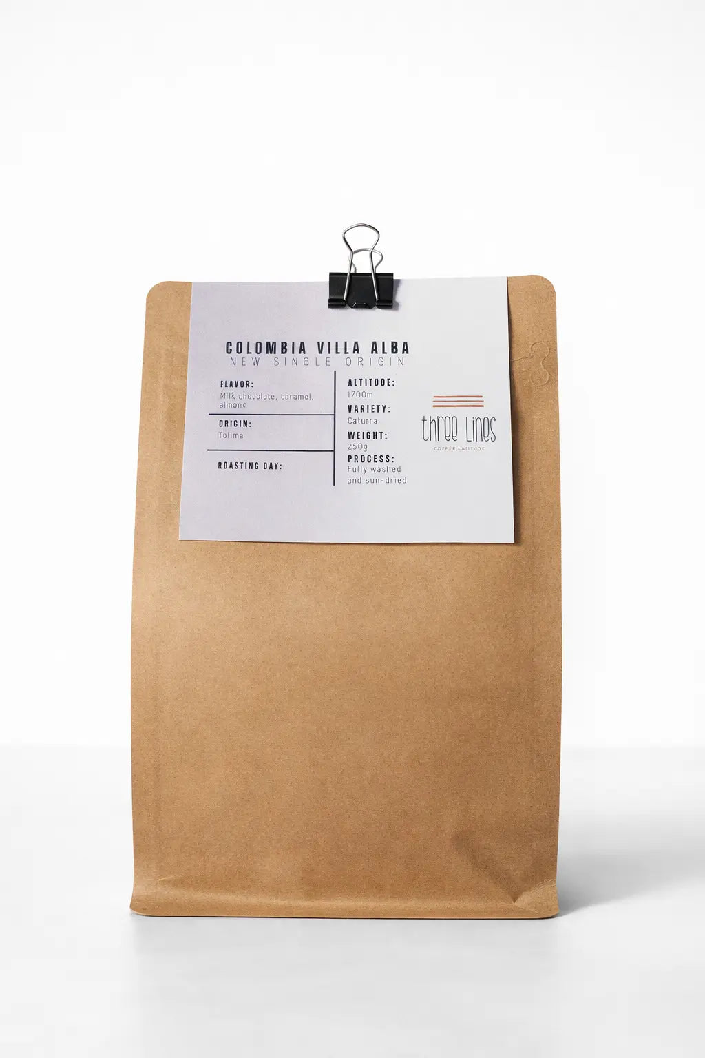 Kraft paper coffee bag with a label on a white background