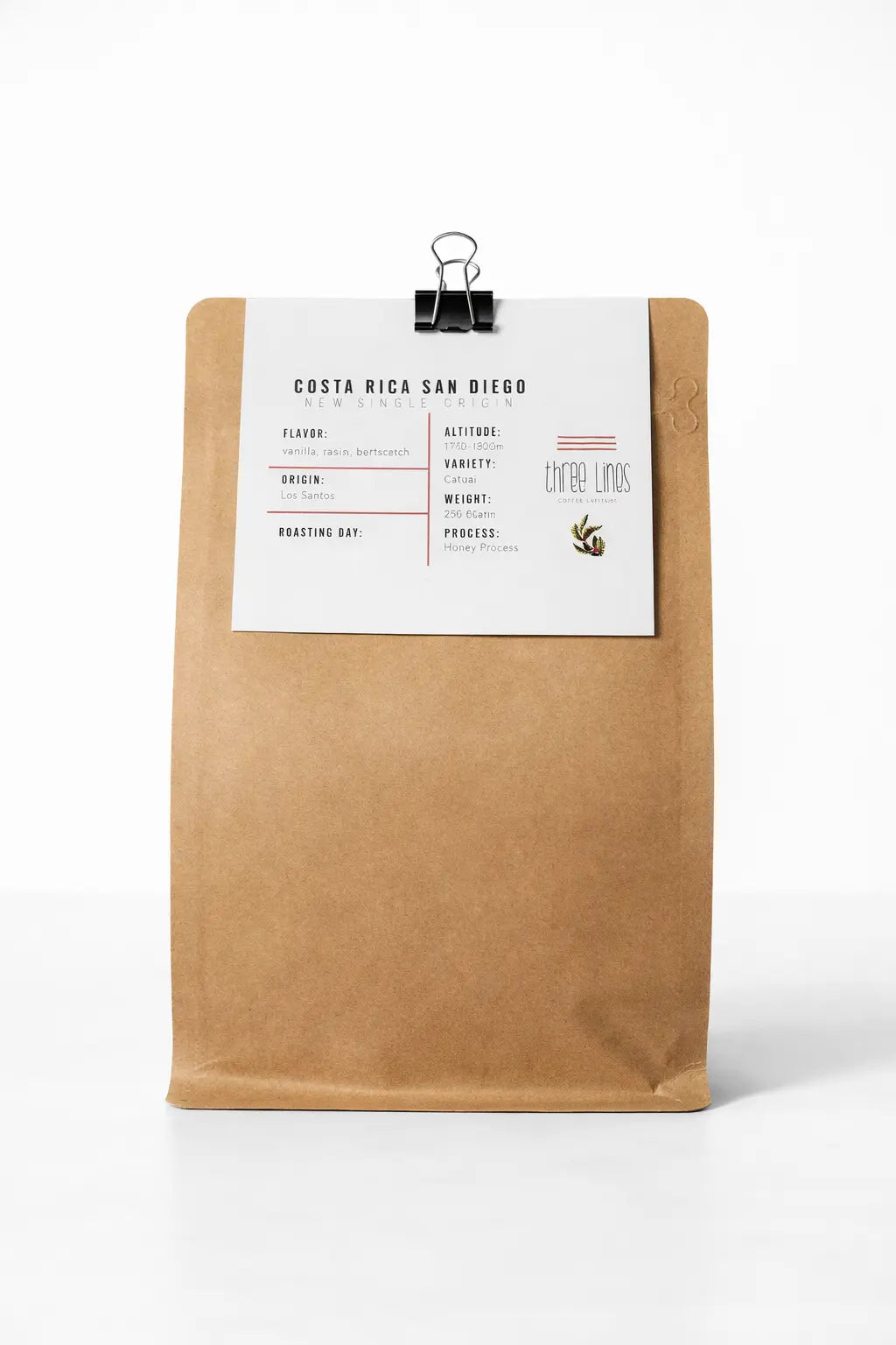 Kraft paper coffee bag with a white label on a white background