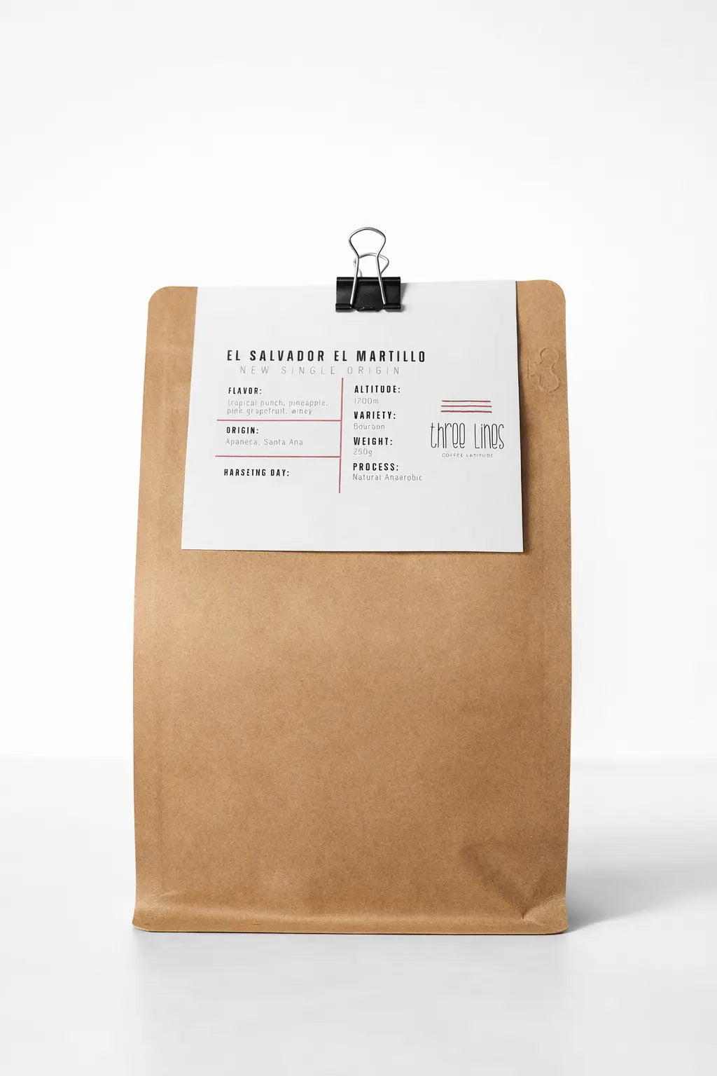 Kraft paper coffee bag with a white label on a white background